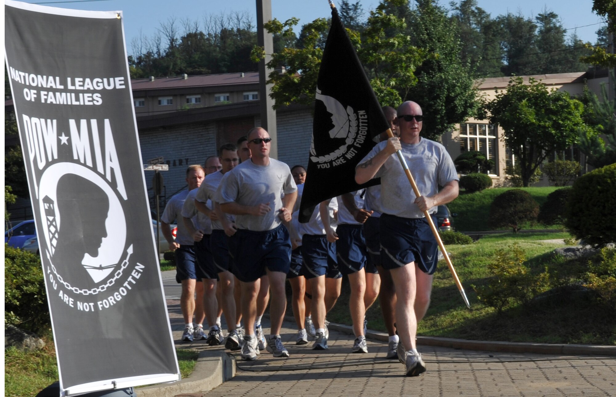 51st Fighter Wing Airmen participate in a 24 hour run during the POW/MIA Recognition Day Sept. 17. National POW/MIA Recognition Day is annually observed in the United States on the third Friday of September. The base held observances and ceremonies for the entire week leading up to the national observance. (U.S. Air Force photo/Senior Airman Evelyn Chavez) 