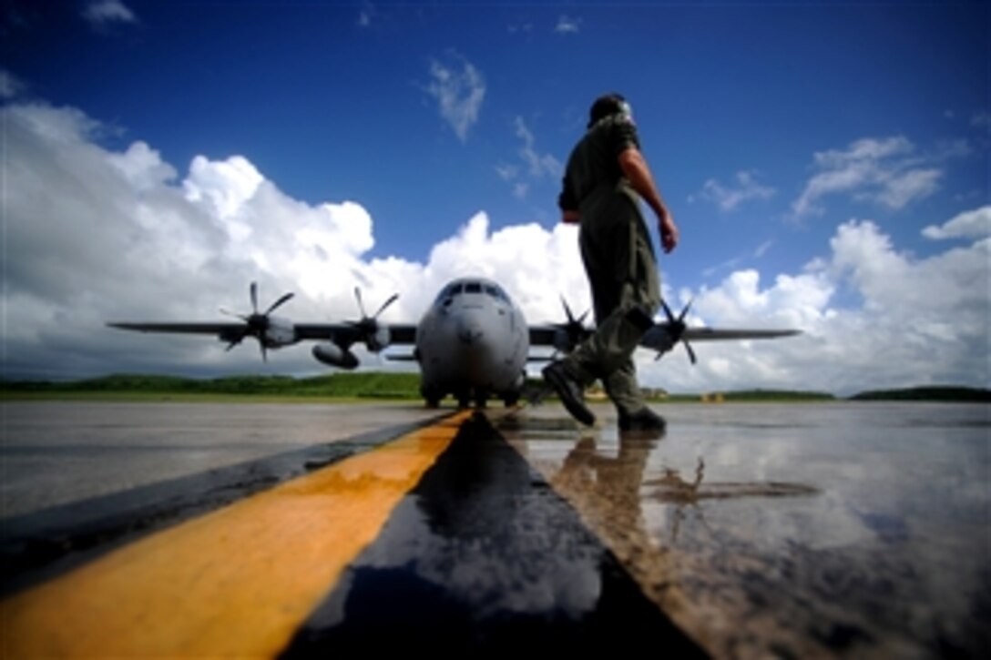 U.S. Air Force Master Sgt. Levi Denham, a WC-130J Hercules aircraft weather reconnaissance loadmaster assigned to the 53rd Reconnaissance Squadron, performs pre-engine start-up inspections in St. Croix, Virgin Islands, on Sept. 16, 2010.  Known as Hurricane Hunters the 53rd Weather Reconnaissance Squadron's mission is to provide surveillance of tropical storms and hurricanes in the Atlantic Ocean, the Caribbean Sea, the Gulf of Mexico and the central Pacific Ocean for the National Hurricane Center in Miami.  