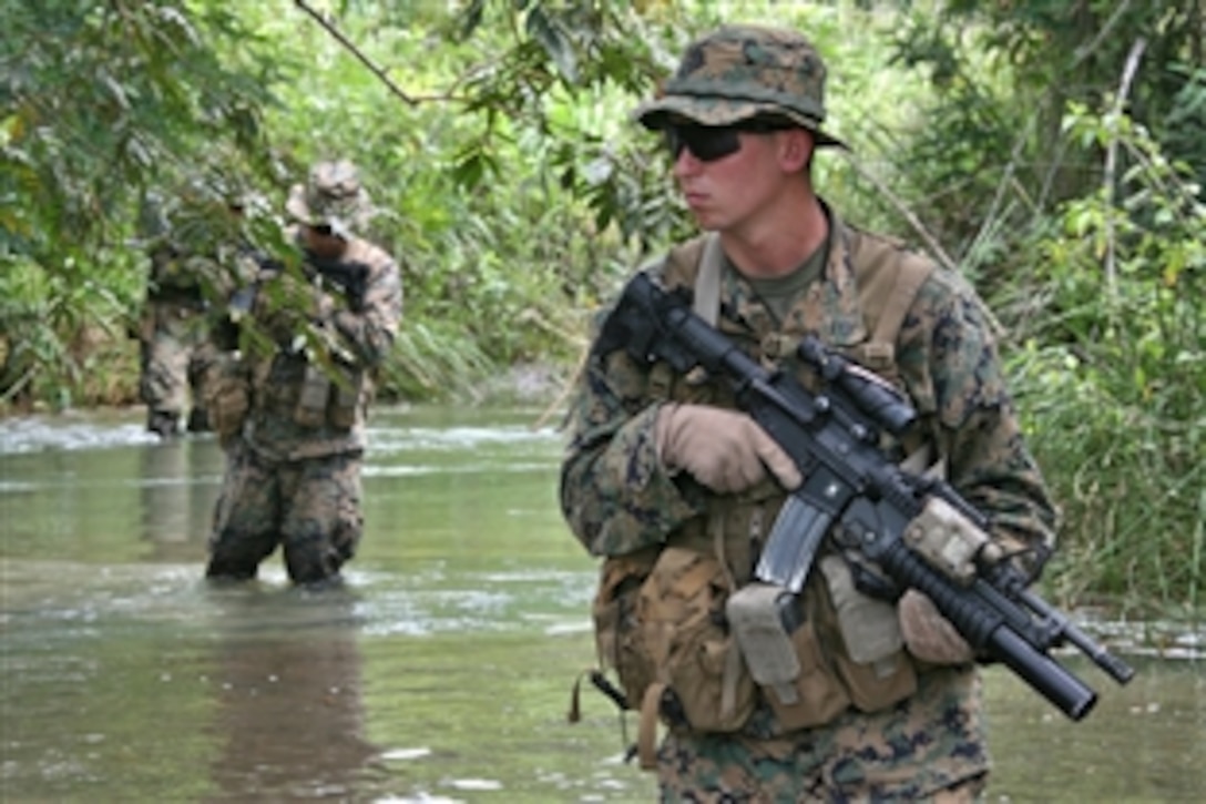 U.S. Marines conduct a jungle-patrol exercise on Poptun Training Camp, Guatemala, Sept. 11, 2010. Patrolling in jungle terrain was part of the subject-matter expert exchange between U.S. Marines and Guatemalan special forces soldiers known as Kaibiles. The Marines are taking part in Operation Continuing Promise 2010, a civic-assistance mission dedicated to providing humanitarian support and facilitating subject-matter expert exchange with partner nations.