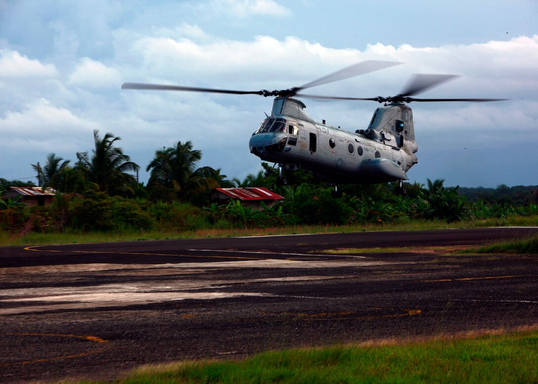 A CH-46E Sea Knight helicopter with Marine Medium Helicopter Squadron (HMM) 774, attached to Special-Purpose Marine Air-Ground Task Force Continuing Promise 2010 (CP10), prepares to land in Bluefields, Nicaragua, Sept. 21, 2010. Service members and civilians are deployed in support of Operation Continuing Promise 2010 providing medical, dental, veterinary, engineering assistance and subject-matter exchanges to the Caribbean, Central and South America. (U.S. Marine Corps photo by Sgt. Samuel R. Beyers/Released)