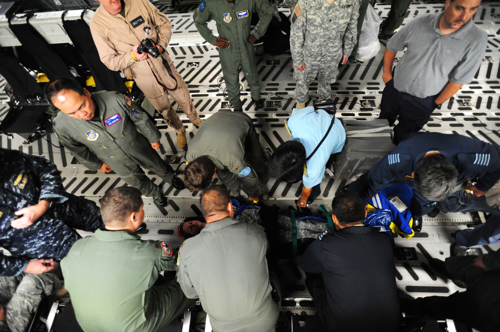 Students in the Joint Medical Attendant Transport Team class learn about an inflatable litter carrier as part of the JMATT training class Sept. 16. The JMATT class provides aeromedical evacuation specialists didactic, hands-on, and experiential training on critical care air transport. (U.S. Air Force photo by Staff Sgt. Nathan Allen)