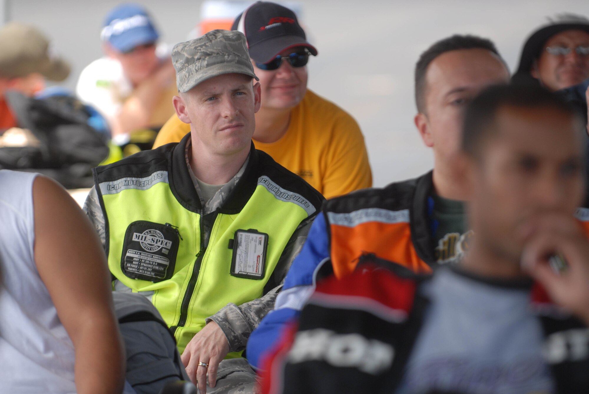 A class of joint-service military members listens to instructors from the California Superbike School during an advanced motorcycle safety course Sept. 15. The 15th Wing safety office hosted the Oahu-wide event at Joint Base Pearl Harbor-Hickam. (U.S. Air Force photo/Staff Sgt. Carolyn Viss)