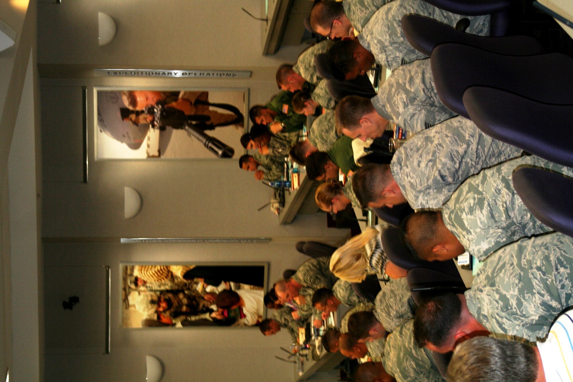 Participants in the Air Mobility Command Phoenix Stripe conference listen in on a briefing Sept. 16, 2010, at the Global Reach Planning Center at Scott Air Force Base, Ill. Phoenix Stripe is a “highly-selective, four-star sponsored” professional development conference for mid-grade enlisted and civilian leaders held twice each year at Headquarters Air Mobility Command. It provides attendees with an operational overview of all facets of AMC’s Global Reach mission, a broad analysis of key issues impacting air mobility and critical insight into each attendee’s contribution to the Total Force air mobility team. (U.S. Air Force Photo/Master Sgt. Scott T. Sturkol)
