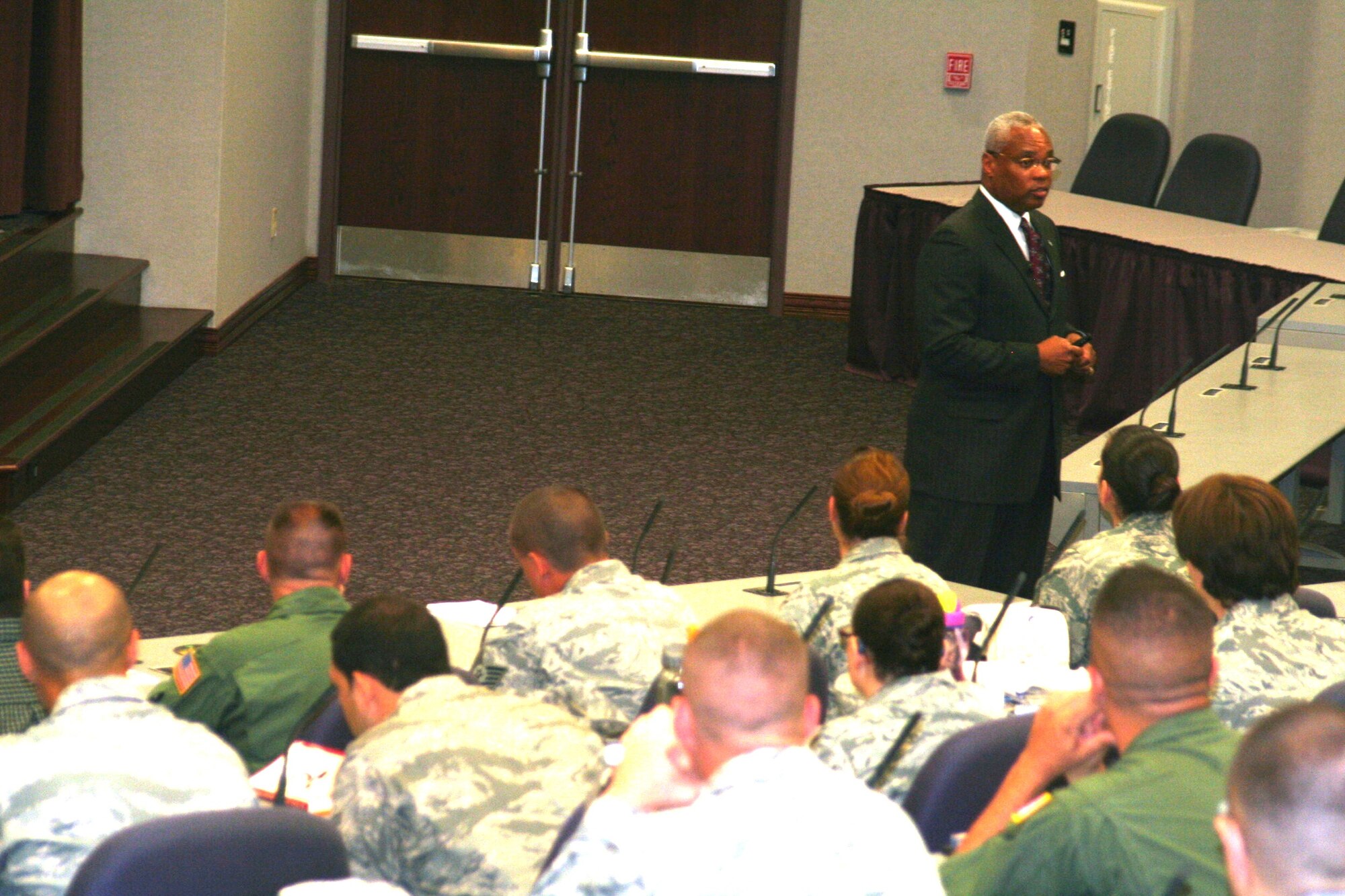 Mr. John H. Bonapart Jr., from Headquarters Air Mobility Command, talks with participants in the AMC Phoenix Stripe conference about senior civilian leadership Sept. 16, 2010, at the Global Reach Planning Center at Scott Air Force Base, Ill. Phoenix Stripe is a “highly-selective, four-star sponsored” professional development conference for mid-grade enlisted and civilian leaders held twice each year at Headquarters Air Mobility Command. It provides attendees with an operational overview of all facets of AMC’s Global Reach mission, a broad analysis of key issues impacting air mobility and critical insight into each attendee’s contribution to the Total Force air mobility team. (U.S. Air Force Photo/Master Sgt. Scott T. Sturkol)