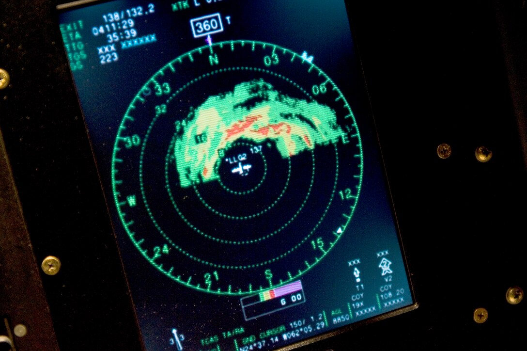 The radar image of Hurricane Igor's eyewall onboard a WC-130J Hercules keeps Airmen from the 53rd  Weather Reconnaissance Squadron busy over the Atlantic Ocean, Sept. 17, 2010.  Known as the "Hurricane Hunters," the 53rd WRS mission is to provide surveillance of tropical storms and hurricanes in the Atlantic Ocean, the Caribbean Sea, the Gulf of Mexico and the central Pacific Ocean for the National Hurricane Center in Miami.  (U.S. Air Force photo/Staff Sgt. Michael B. Keller)  