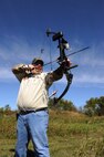 MINOT AIR FORCE BASE, N.D. -- Jeff Jones, 5th Civil Engineer Squadron deputy chief of operations, aims at a fake moose at the 3-D archery range during a tournament held by the Outdoor Recreation Center here Sept 18. The Outdoor Recreation Center holds tournaments annually and occasionally gives a brand new bow to the first place winner. Events such as these are integral to the team morale of Air Force Global Strike Airmen stationed here. (U.S. Air Force photo by Airman 1st Class Aaron-Forrest Wainwright)
