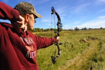 MINOT AIR FORCE BASE, N.D. -- Master Sgt. Jason Augdahl, 219th Security Forces Squadron first sergeant, aims at a fake bobcat at the 3-D archery range during a tournament held by the Outdoor Recreational Center here Sept 18. The Outdoor Recreation Center holds tournaments annually and occasionally gives a brand new bow to the first place winners. Events such as these are integral to the team morale of Air Force Global Strike Airmen stationed here. (U.S. Air Force photo by Airman 1st Class Aaron-Forrest Wainwright)