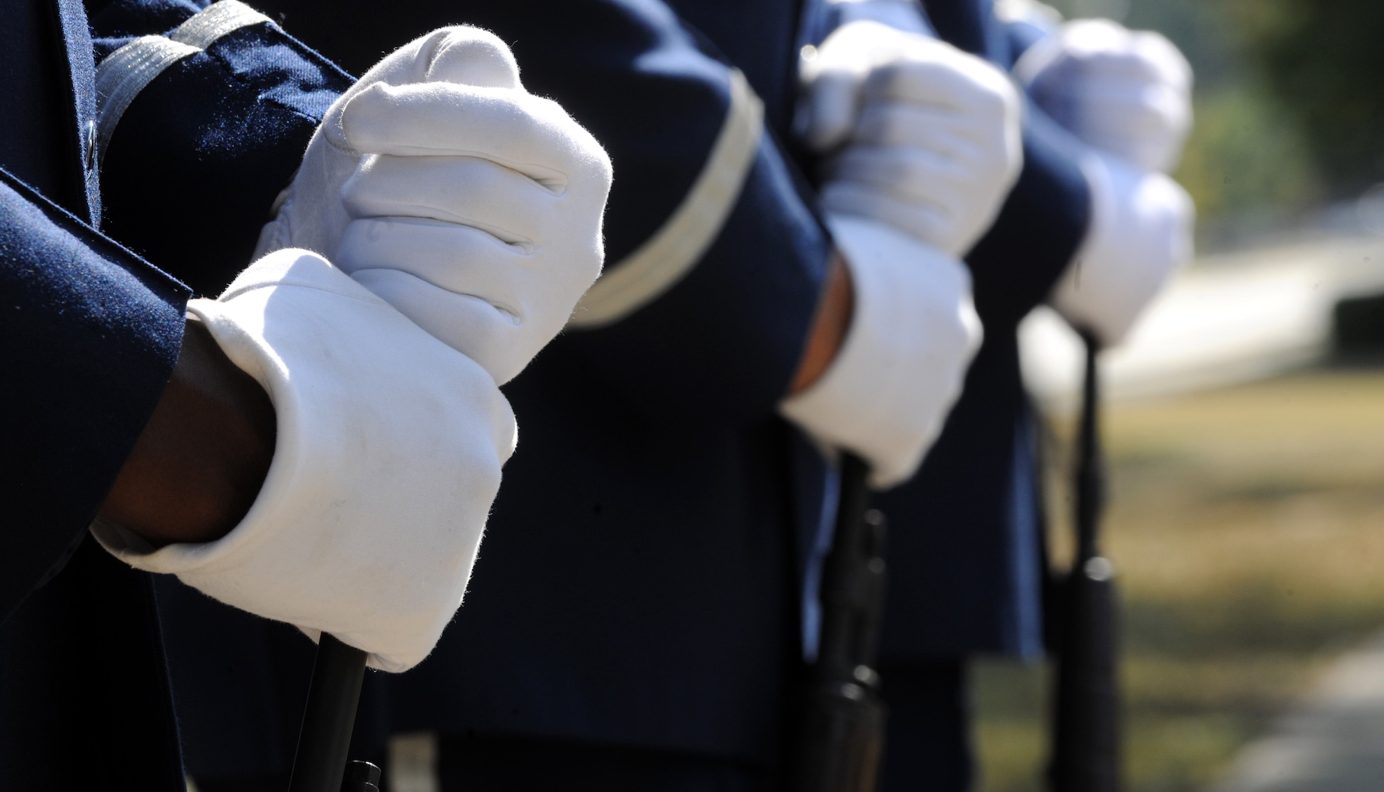 MOODY AIR FORCE BASE, Ga. -- The Moody Honor Guard stands ready to render a final firing line during the Prisoner of War/Missing in Action Recognition Day Ceremony held here Sept. 17. The Honor Guard participated with a firing line, playing of the Taps and the folding of the flag. (U.S. Air Force photo/Airman 1st Class Benjamin Wiseman) 