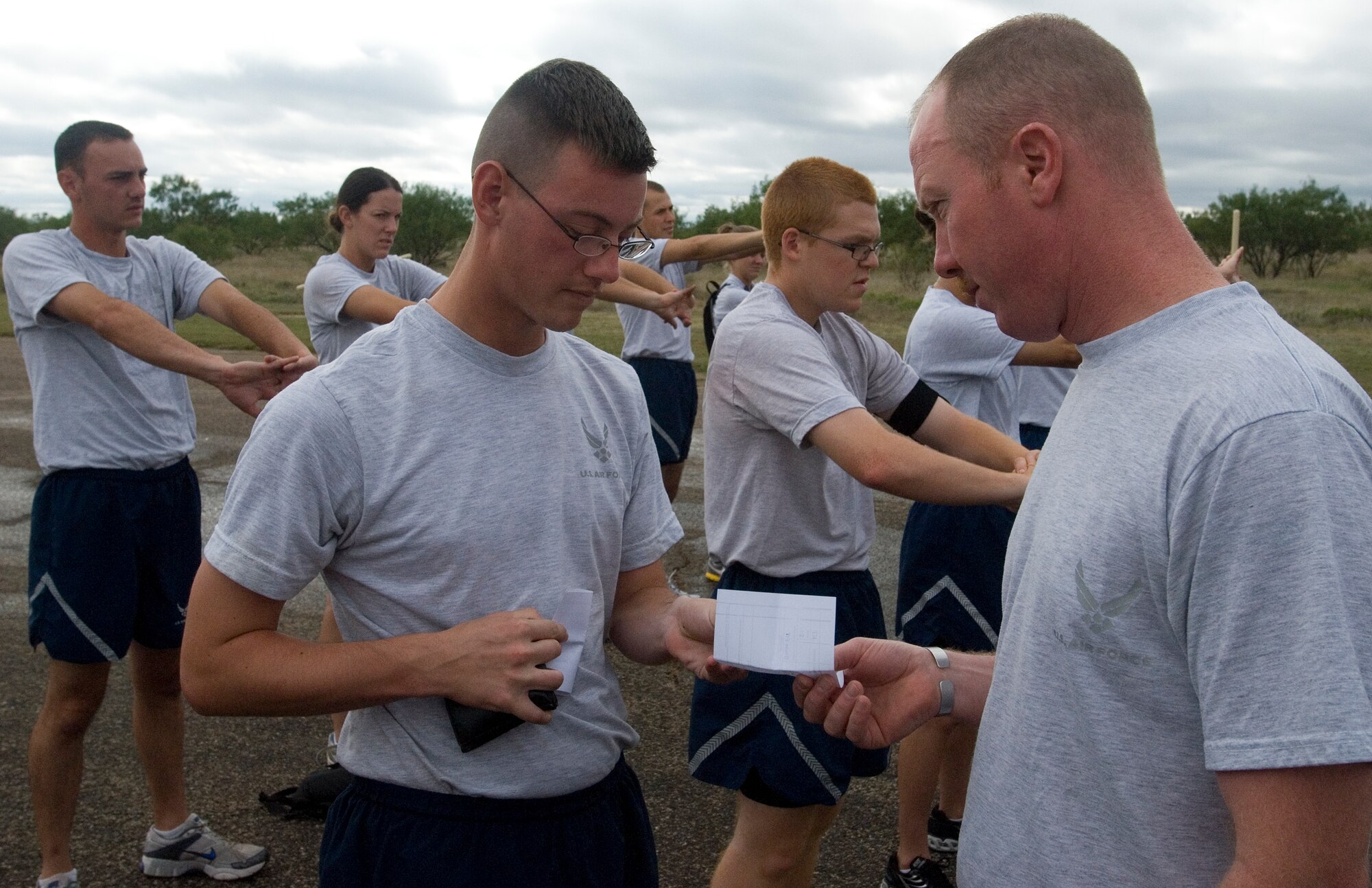 GOODFELLOW AIR FORCE BASE, Texas - Tech. Sgt. David Alonso, 315th Training Squadron Military Training Leader, pulls an Air Education and Training Command Form 341 from an Airman during physical training Sept 20. The AETC Form 341, known as a 341, is used to recognize exceptional performance or discrepancies.  MTL’s are a key part of an Airman’s military training. The Air AETC Special Duty Team visited Goodfellow Tuesday and spoke about special duty an Air Force Recruiter, Military Training Instructor and Military Training Leader.  Air Force members who may have missed the team’s visit can contact Master Sgt. Kenneth Guise at (325) 654-3589, or stop by building 901 for more information. (U.S. Air Force photo/Master Sgt. Randy Mallard)
