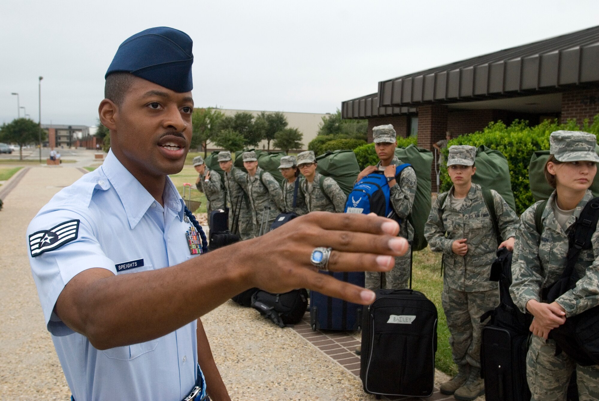 GOODFELLOW AIR FORCE BASE, Texas - Staff Sgt. Derrell Speights, 315th Training Squadron Military Training Leader, gives instructions to a group of Airmen fresh from Basic Military Training at Lackland Air Force Base in San Antonio, after their arrival here for technical training Sept 20.  MTL’s are a key part of an Airman’s military training. The Air Education and Training Command Special Duty Team visited Goodfellow Tuesday and spoke about special duty an Air Force Recruiter, Military Training Instructor and Military Training Leader.  Air Force members who may have missed the team’s visit can contact Master Sgt. Kenneth Guise at (325) 654-3589, or stop by building 901 for more information. (U.S. Air Force photo/Master Sgt. Randy Mallard)