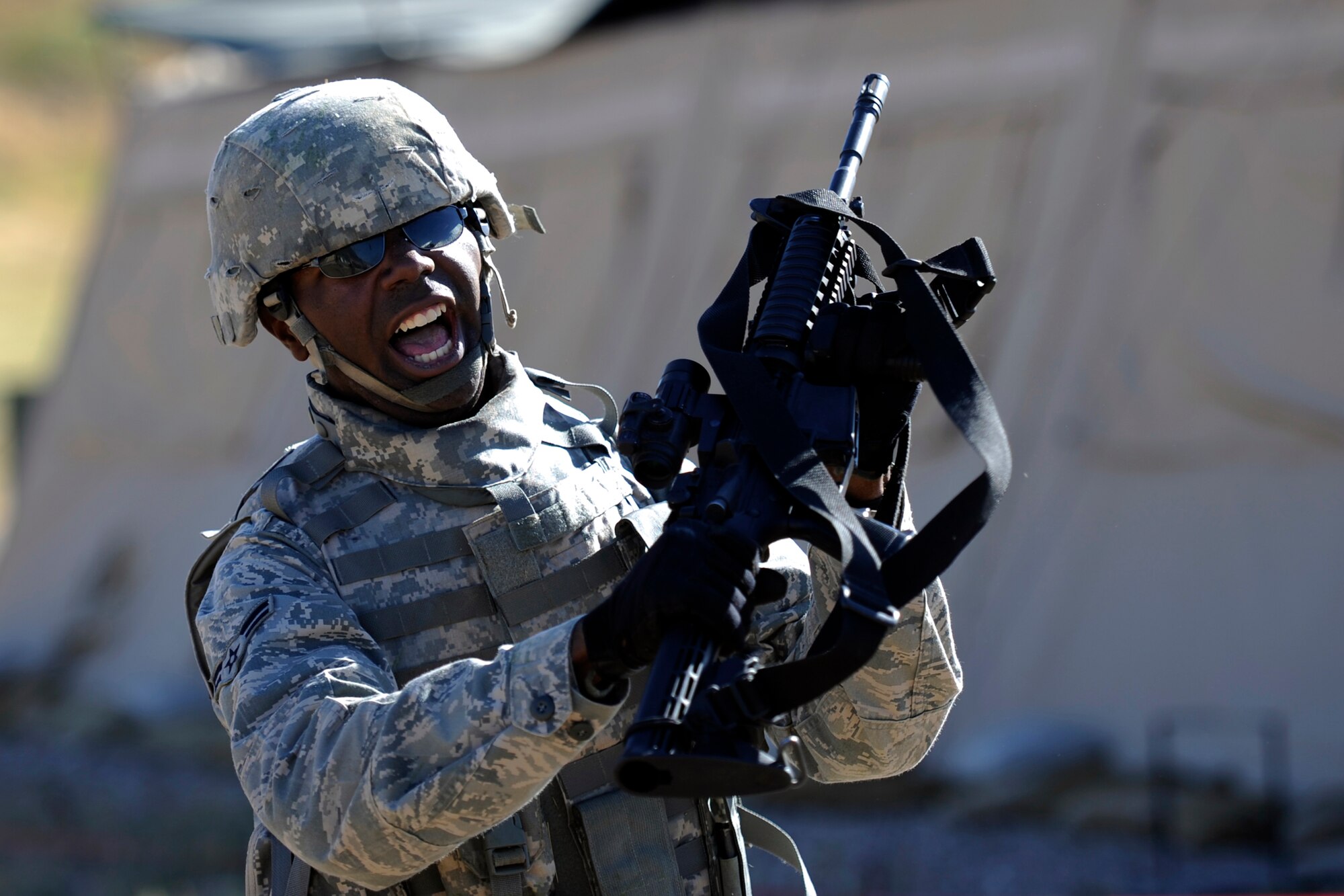 Airman 1st Class , an entry controller with the 75th Security Forces Squadron, practices rifle fighting techniques during Security Forces Combat Readiness Training at Hill Air Force Base, Utah on Sept. 13, 2010. The CRT course is used to provide airman with the basic skills needed to deploy to include tactical movements, land navigation, and self aid buddy care. (U.S. Air Force photo by Staff Sgt. Renae Saylock) 