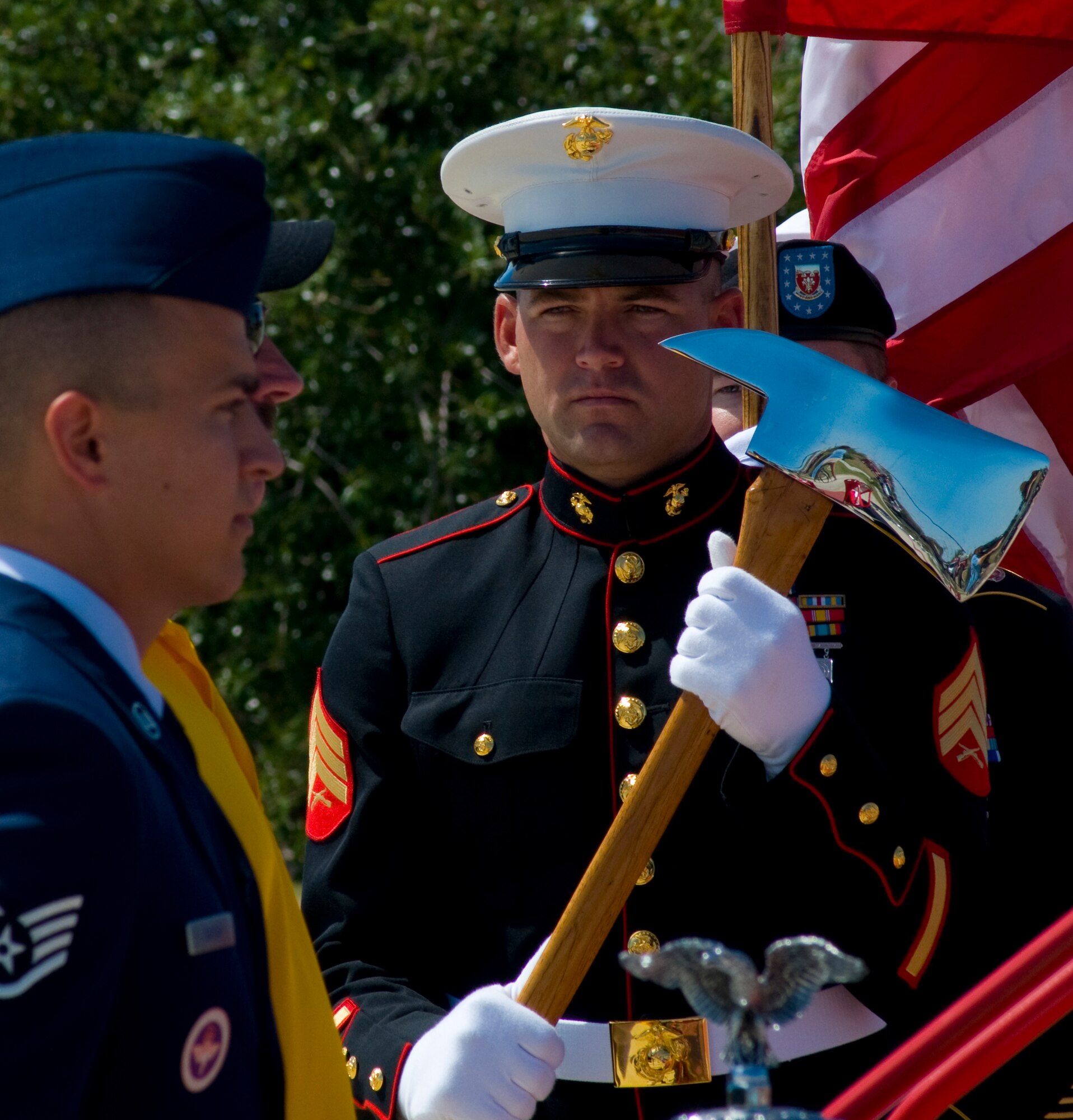 GOODFELLOW AIR FORCE BASE, Texas – U.S. Marine Corps Honor Guard member, Sgt. William Alexander, and the Louis F. Garland Fire Academy Joint Honor Guard detail was present to post the Colors, during the Fifth Annual Department of Defense Fallen Firefighter Memorial remembrance Sept. 18. More than 100 people, including 80 motorcyclists, gathered at the Firefighter Memorial on base to show homage to DOD firefighters who paid the ultimate sacrifice. (U.S. Air Force photo/ Senior Airman Tong Duong)
