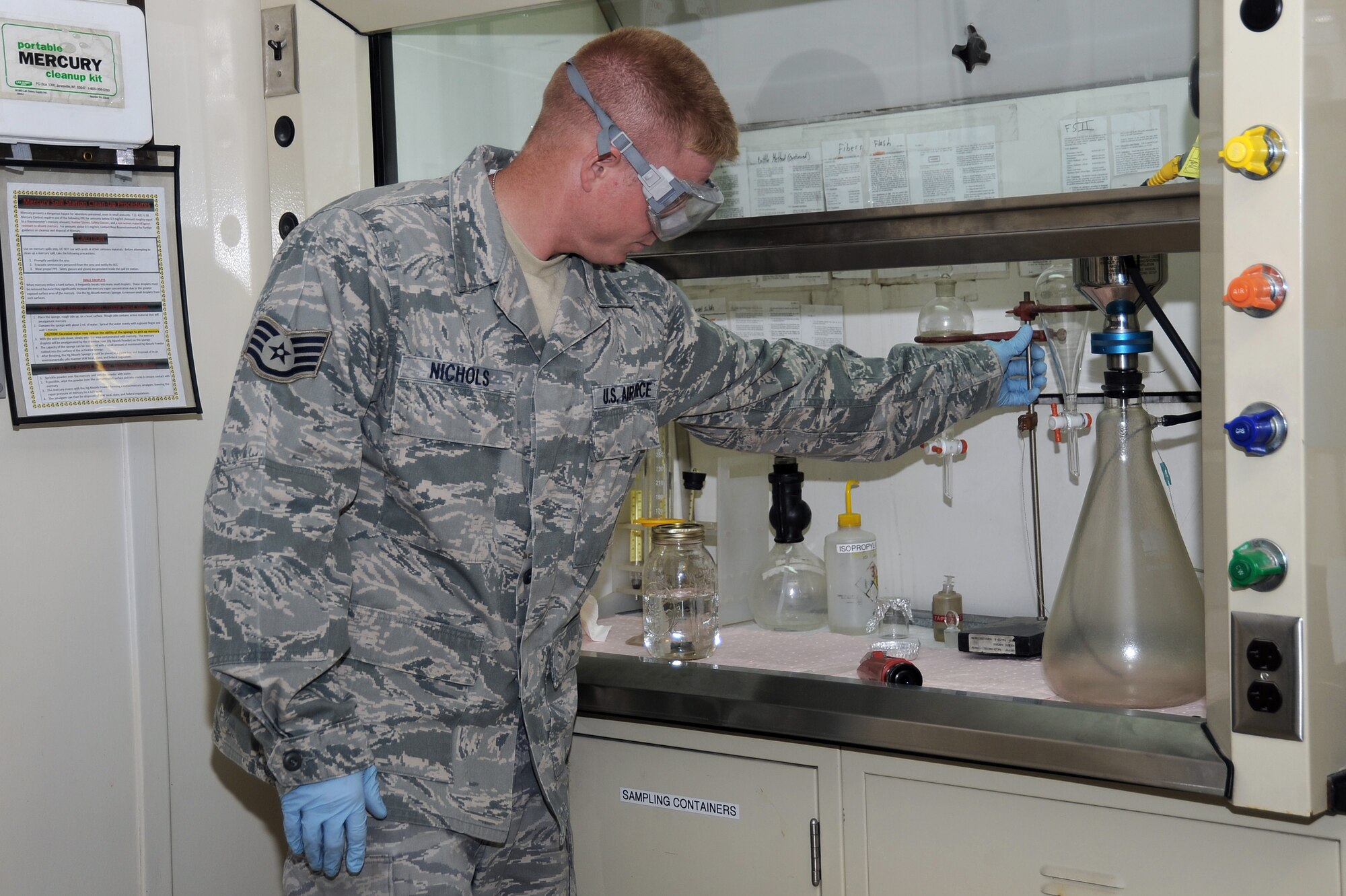 Staff Sgt. Matthew Nichols, 380th Expeditionary Logistics Readiness Squadron fuels laboratory NCO in charge, prepares a fuel sample for testing Aug. 26, 2010, at an undisclosed location in Southwest Asia. (U.S. Air Force photo/Tech. Sgt. April Wickes)