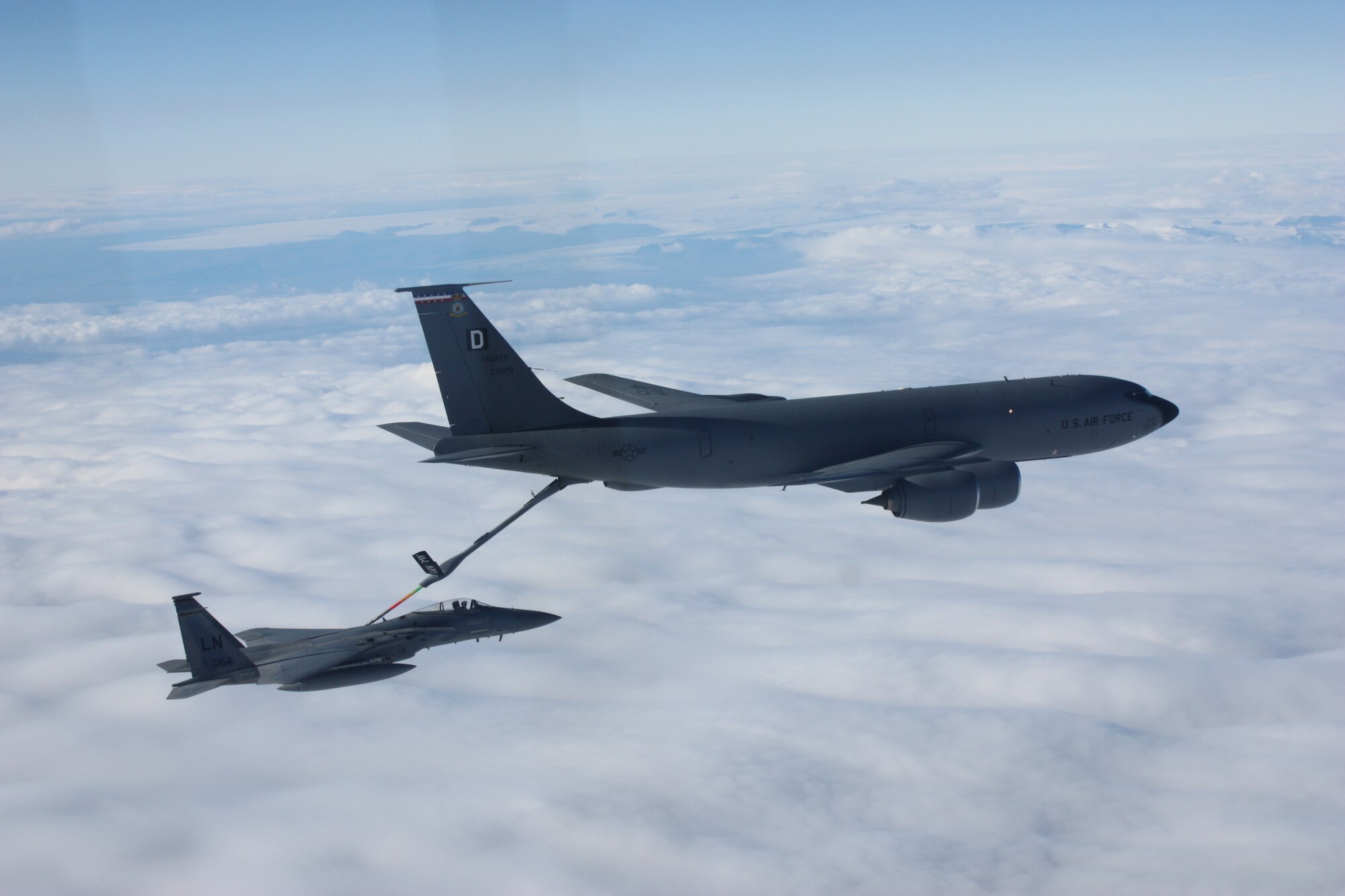 KEFLAVIK, Iceland – A KC-135 Stratotanker deployed from the 100th Air Refueling Wing at RAF Mildenhall, England, refuels an F-15C Eagle that is deployed from the 48th Fighter Wing at RAF Lakenheath, England, during a flight in support of NATO’s Icelandic Air Policing mission Sept. 15, 2010. The 493rd Expeditionary Fighter Squadron has been maintaining control of the IAP mission Sept. 6, 2010, when the squadron achieved full operational capable status. (U.S. Air Force photo/Maj. Andrew Rose)
