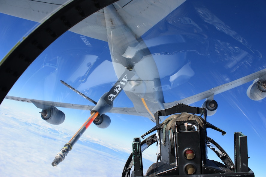 KEFLAVIK, Iceland – An F-15D Eagle moves behind a KC-135 Stratotanker for aerial refueling in support of the Icelandic Air Policing mission Sept. 15, 2010. The F-15 Eagles are deployed from the 48th Fighter Wing at RAF Lakenheath, England and the KC-135 Stratotanker is deployed from the 100th Air Refueling Wing at RAF Mildenhall, England. (U.S. Air Force photo/Maj. Andrew Rose)