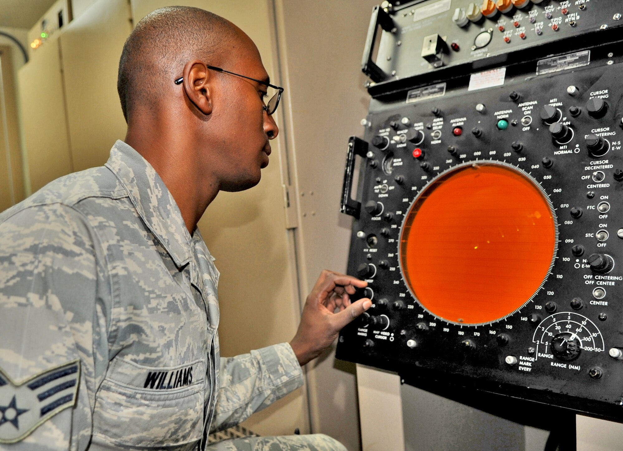 SPANGDAHLEM AIR BASE, Germany -Senior Airman Michael Williams, 52nd Communications Squadron ground radar systems journeyman, checks video returns on a maintenance indicator Sept. 9. Radar maintainers follow a set of technical orders focusing specifically on maintenance tasks, procedures and intervals for preventative maintenance inspections which include 79 separate items to certify the radar is functioning properly. (U.S. Air Force photo story/Senior Airman Nick Wilson)