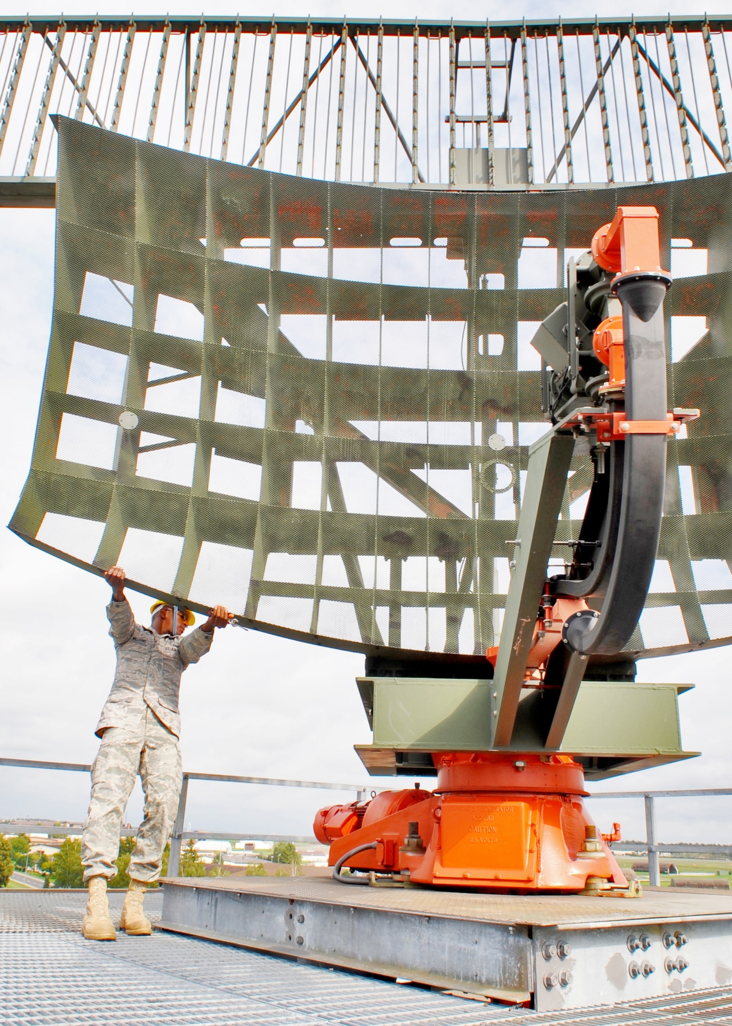 SPANGDAHLEM AIR BASE, Germany -Senior Airman Michael Williams, 52nd Communications Squadron ground radar systems journeyman, watches a motor as he spins the antenna of a radar system Sept. 9. Maintaining these radar systems is an around-the-clock job requiring 1,700 preventative maintenance inspections annually and a technician on call 24 hours a day. (U.S. Air Force photo/Airman 1st Class Nick Wilson)