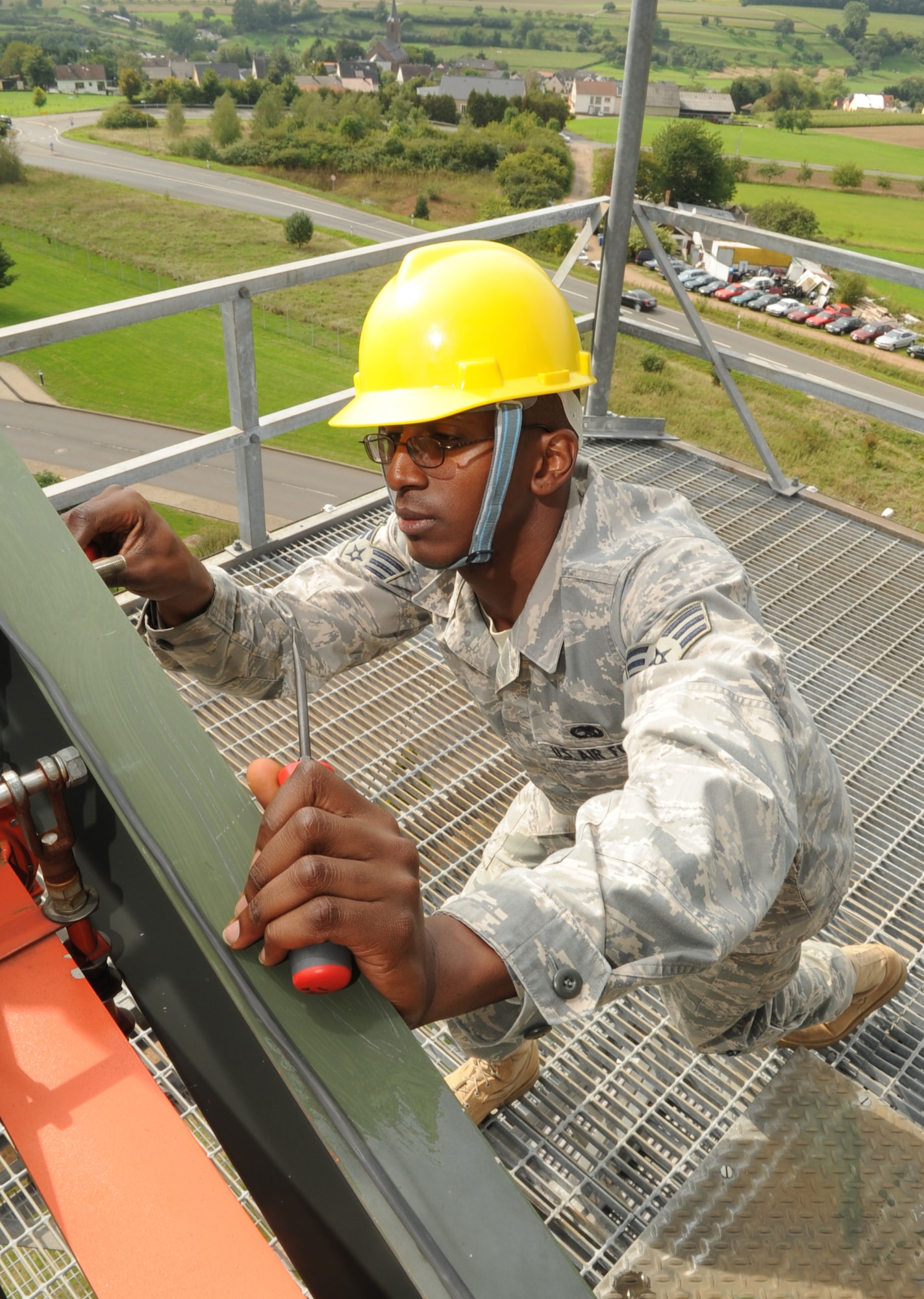 SPANGDAHLEM AIR BASE, Germany - Senior Airman Michael Williams, 52nd Communications Squadron ground radar systems journeyman, checks polarizers on a radar system Sept. 9. Airman Williams is responsible for performing preventative maintenance on the radar systems for proper functioning that provides a vital link between the control tower and aircraft. (U.S. Air Force photo/Airman 1st Class Nick Wilson)