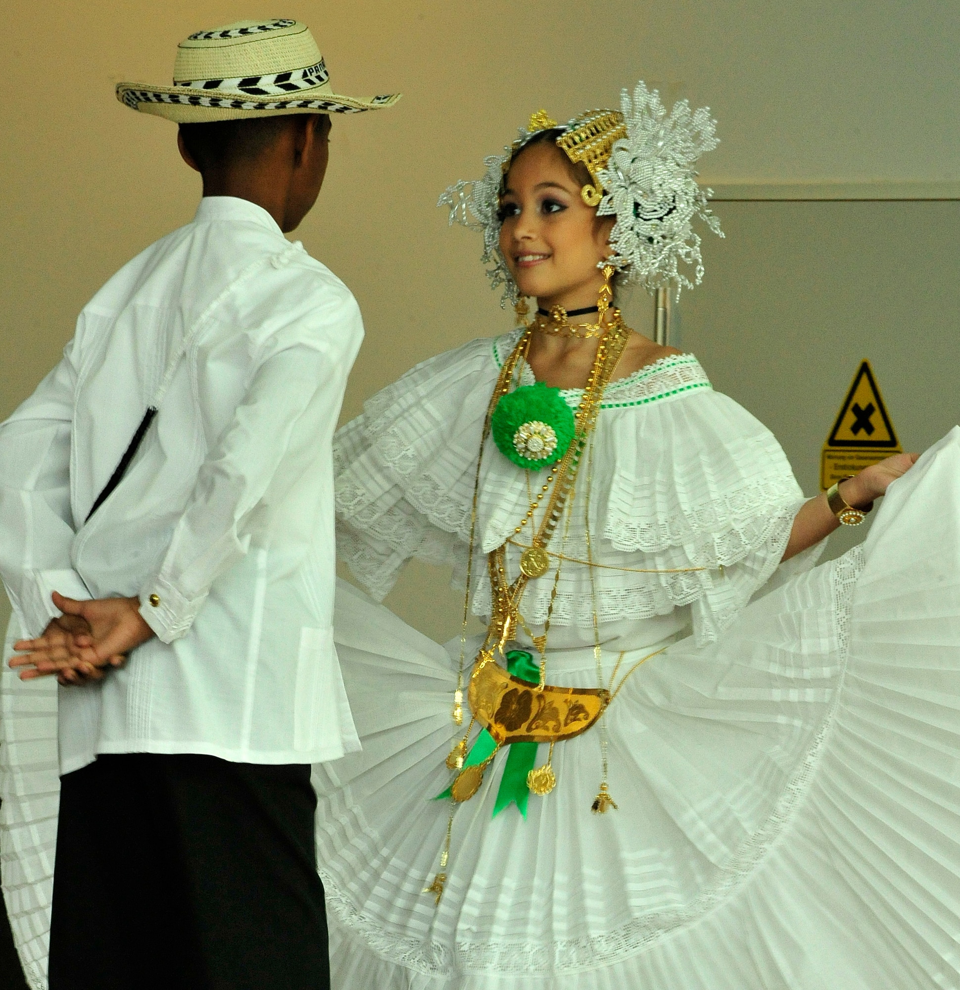 U.S. Army dependants Brandon Howell and Melanie Aberg, perform a traditional Panamanian courtship dance titled "El Punto", during the Hispanic Heritage month kickoff event held at the Kaiserslautern Military Community Center, Ramstein Air Base, Germany, Sept. 18, 2010. Hispanic Heritage month events celebrate heritage, diversity, integrity and honor and take place from Sept. 15 through Oct. 15 this year. (U.S. Air Force photo by Staff Sgt. Stephen J. Otero)