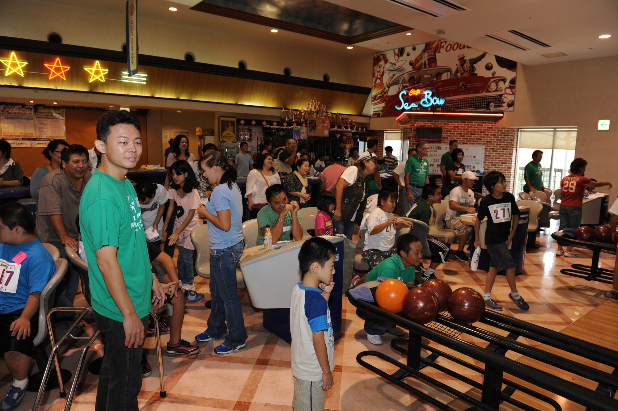 Athletes, family members, and volunteers prepare to bowl at the Kadena Special Olympics Bowling event in Mihama, Okinawa, September 18, 2010. The event, attended by more than 300, was one of many events leading up to the 11th Annual Kadena Special Olympics, which will be held at Kadena Air Base in November. (U.S. Air Force Photo/Tech Sgt. Jason W. Edwards)