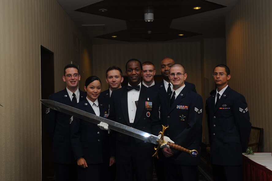 Airmen from across the 501st Combat Support Wing attend the Order of the Sword Ceremony for General Roger Brady. (U.S. Air Force photo by Staff Sgt. Brok McCarthy) 
