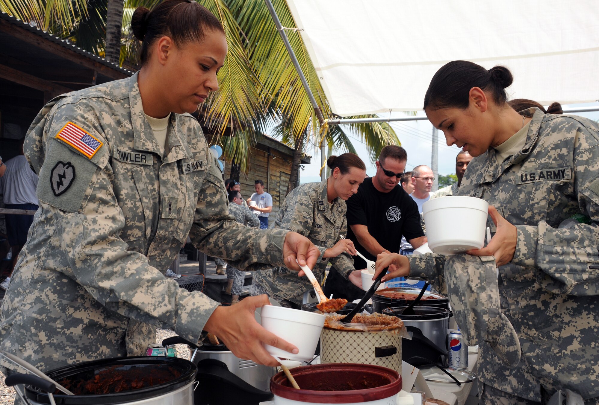 SOTO CANO AIR BASE, Honduras --  Soldiers, Airmen, Sailors and Marines joined together to celebrate the 63rd birthday of the U.S. Air Force and taste the saucy concoctions of Team Bravo's chili masters here Sept. 17. Besides the chili cook-off, the 612th Air Base Squadron, which hosted the event, gave Team Bravo a free barbecue meal and demonstrations of the unit's non-culinary capabilities. (U.S. Air Force photo/Tech. Sgt. Benjamin Rojek)