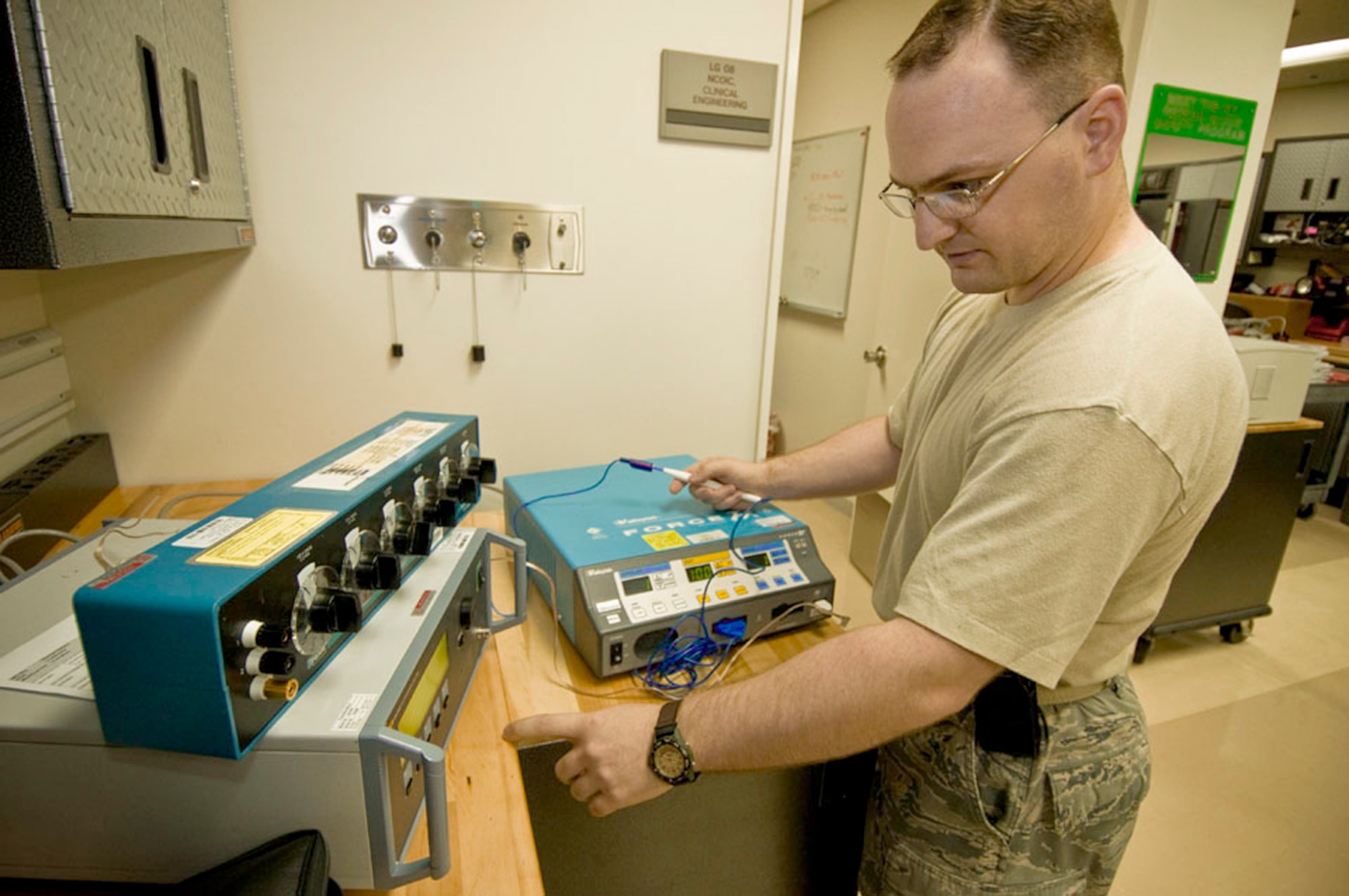 Staff Sgt. Ryan Flynn tests the output currency of an electric surgical scalpel Sept. 21, 2010, at the hospital at Misawa Air Base, Japan. Sergeant Flynn is a 35th Medical Support Squadron biomedical equipment technician. (U.S. Air Force photo/Senior Airman Jessica Lockoski)