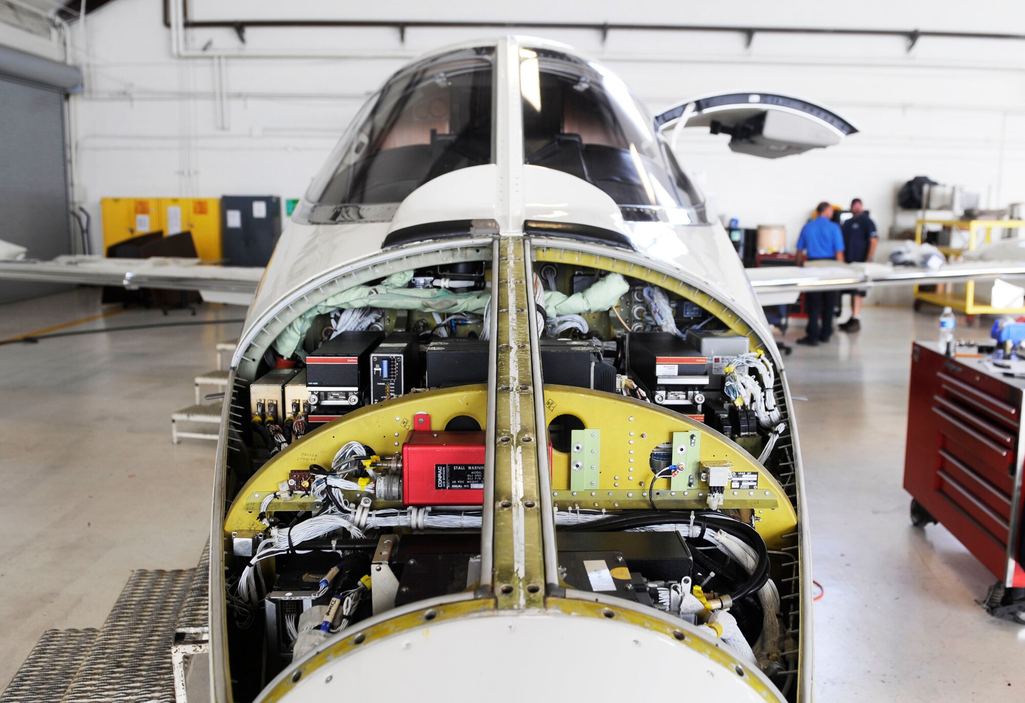 SCOTT AIR FORCE BASE, Ill. -- A C-21 is worked on during a phase inspection at Scott AFB, Sept. 16, 2010. The phase inspections are done on aircraft after they reach flying milestones to ensure the aircraft remain in tip-top shape. (U.S. Air Force photo by Staff Sgt. Ryan Crane)