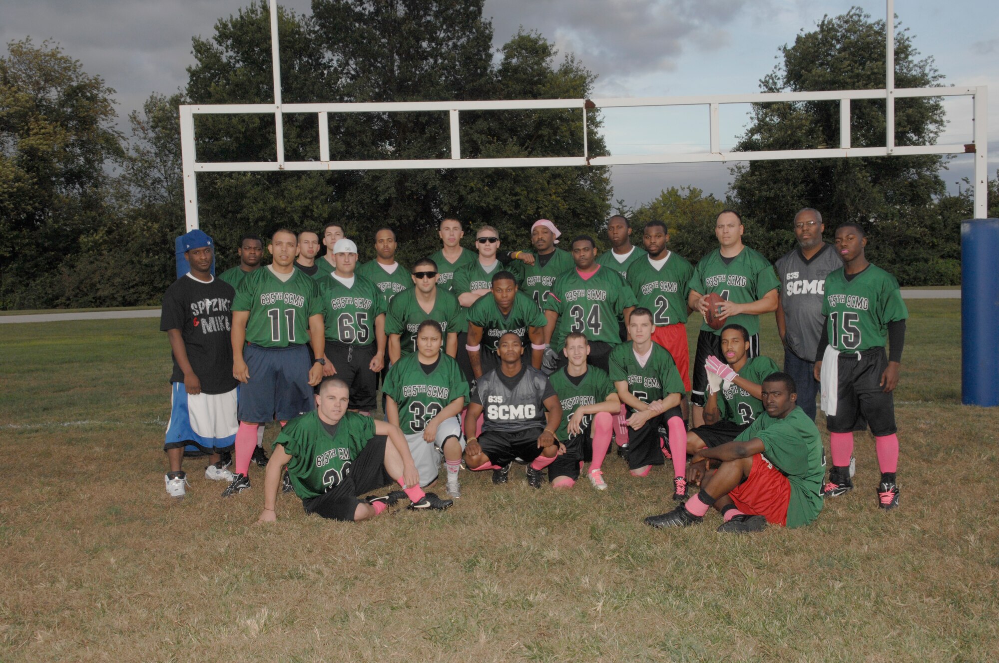 SCOTT AIR FORCE BASE, Ill. -- The 635th Supply Chain Operations Group all wear an article of pink clothing during their games in support of cancer research. (U.S. Air Force photo/Senior Airman Amber R. Kelly-Herard)