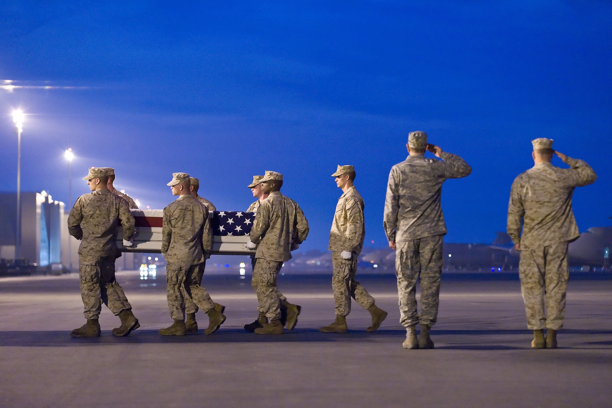 A U.S. Marine Corps team transfers the remains of Marine Corps Lance Cpl. Christopher B. Rodgers, of Griffin, Ga., at Dover Air Force Base, Del., Sept. 3, 2010. Rodgers was assigned to the 1st Battalion, 2nd Marine Regiment, 2nd Marine Division, II Marine Expeditionary Force, Camp Lejeune, N.C.  (U.S. Air Force photo/Roland Balik)