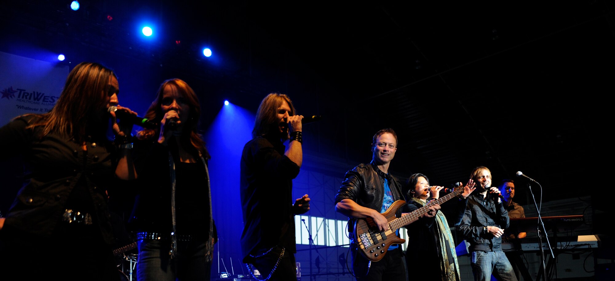Gary Sinise and the Lt. Dan Band play during a USO Show Sept. 18, 2010, Eielson Air Force Base, Alaska. Mr. Sinise and the Lt. Dan Band play USO Shows all around the country. Mr. Sinise is an actor and musician. (U.S. Air Force photo/Senior Airman Willard E. Grande II)