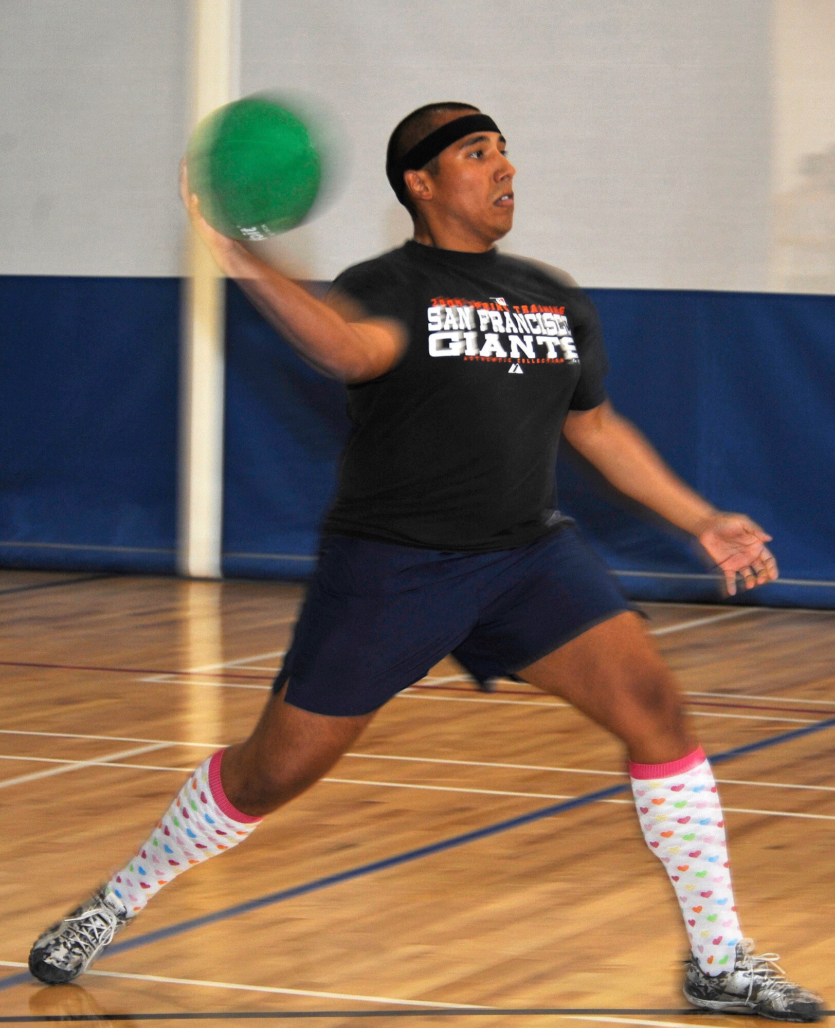HOLLOMAN AIR FORCE BASE, N.M. -- First Lt. Jessie Murillo, 49th Force Support Squadron, throws a dodge ball at his opponents during Sports Day, Sept. 17, 2010. Airmen from different squadrons participated in a game of dodge ball, with five members from each team going head-to-head to try to knock-out their opponents without getting hit. (U.S. Air Force photo by Senior Airman Veronica Stamps / Released)