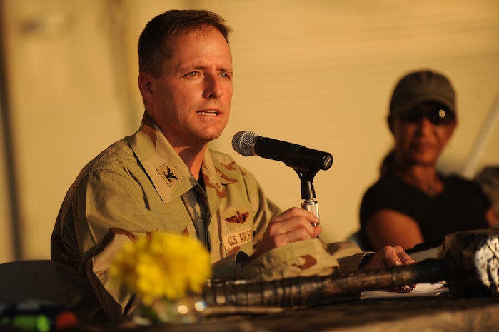 Col. John Wood gives his opening remarks during the combat dining out on Joint Base Charleston, S.C., Sept. 17, 2010. The 437th Airlift Wing hosted the event to promote esprit de corps within the ranks with food, drinks, fun, games and entertainment. Colonel Wood is the 437th Airlift Wing commander. (U.S. Air Force photo/James M. Bowman)(Released)