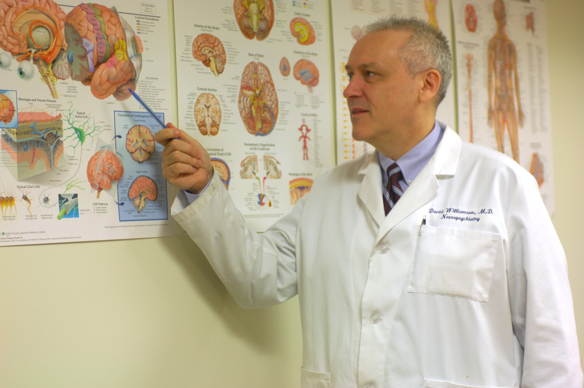 Dr. David Williamson, medical director for the Inpatient Psychological Heath and Traumatic Brain Injury program at the National Naval Medical Center in Bethesda, Md., and his staff are breaking new ground in identifying and treating traumatic brain injuries and mental-health issues.  (U.S. Navy photo/Seaman Alexandra Snow) 