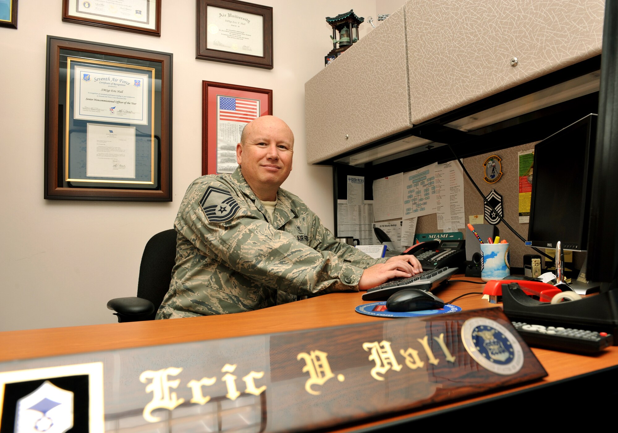 100921-F-4406D-000 SHAW AIR FORCE BASE, S.C.-Senior Master Sgt. Eric Hall, 20th Dental Squadron superintendent poses at his desk at the Dental Squadron here, Sept. 21, 2010. Sergeant Hall was awarded the Lance P. Sijan award, which recognizes Airmen who have displayed selfless service and excellent leadership skills while assigned to an organization at the wing level and below. (U.S.  Air Force photo/Airman 1st Class Tabatha L. Duarte (Released)