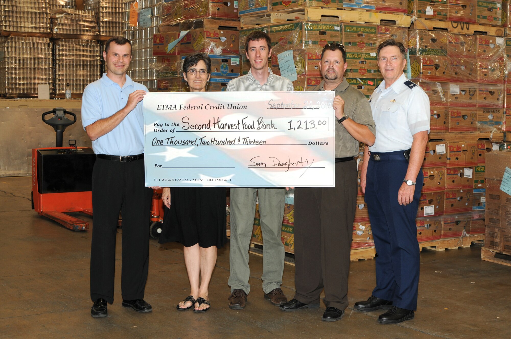 KNOXVILLE, Tenn. - The I.G. Brown Air National Guard Training and Education Center presents a check for $1,213 to the Second Harvest Food Bank of East Tennessee at their distribution center in Knoxville, Sept. 20, 2010. The funds were raised during the 2010 Clod Classic golf tournament.  From L-R are Rick Mikels, East Tennessee Military Association Federal Credit Union; Patty Ford and John Bell, Second Harvest Food Bank; Master Sgt. Sam Daugherty and Col. Richard B. Howard, The I.G. Brown Air National Guard Training and Education Center.  (U.S. Air Force photo by Master Sgt. Mavi Smith/Released)
