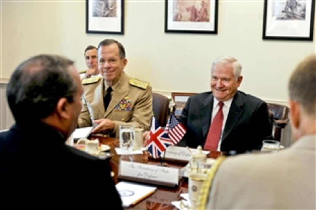 U.S. Defense Secretary Robert M. Gates and U.S. Navy Adm. Mike Mullen, chairman of the Joint Chiefs of Staff, meet with U.K. Defense Secretary Liam Fox at the Pentagon, Sept. 22, 2010.