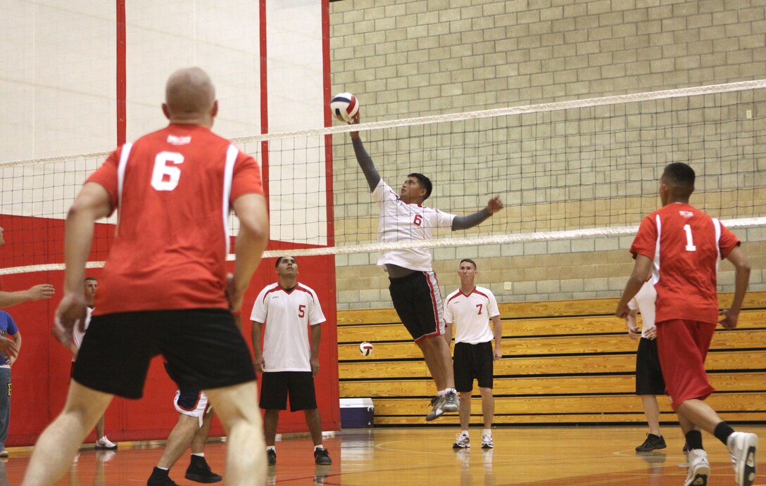 Froilon Tyler, volleyball participant with Marine Corps Air Station’s team, lobs the ball over the net at Camp Pendleton’s Paige Fieldhouse during the Marine Corps Community Service’s Pendleton Cup’s opening night of the Volleyball League, Sept. 22. The series leader is the Naval Hospital Camp Pendleton’s team, followed by Supply Battalion in second place. Marine Corps Air Station is currently tied for third place along with Marine Wing Support Squadron 372, Marine Corps Installation West, Medical Battalion, and 9th Communication’s Battalion.