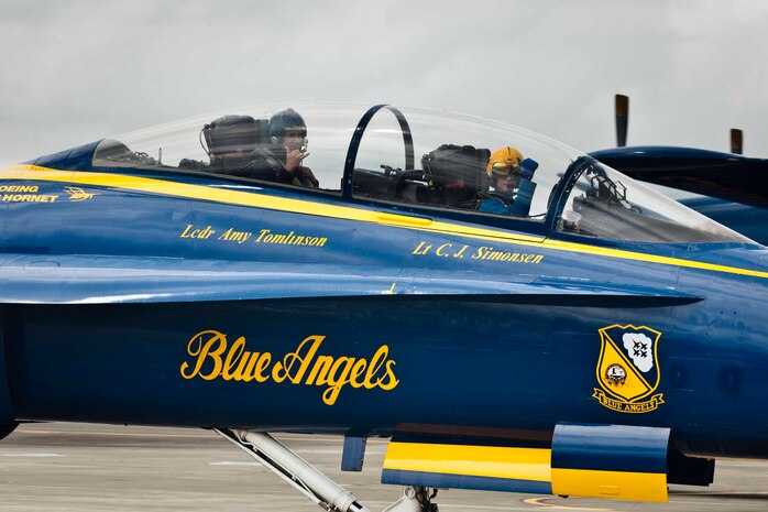 Arnold Martinez, head football coach and physical education teacher at Moanalua High School in Honolulu, and Navy pilot Lt. C. J. Simonsen taxi onto the flight line in one of the Blue Angels F/A-18 Hornet fighter jets at Marine Corps Air Station Kaneohe Bay, Hawaii, Sept. 22, 2010. Martinez was one of several local figures awarded a key influencer flight in one of the Blue Angels. The famed jets, part of the U.S. Navy’s Flight Demonstration Squadron, are slated to perform during the Kaneohe Bay Airshow here Sept. 25 to 26.