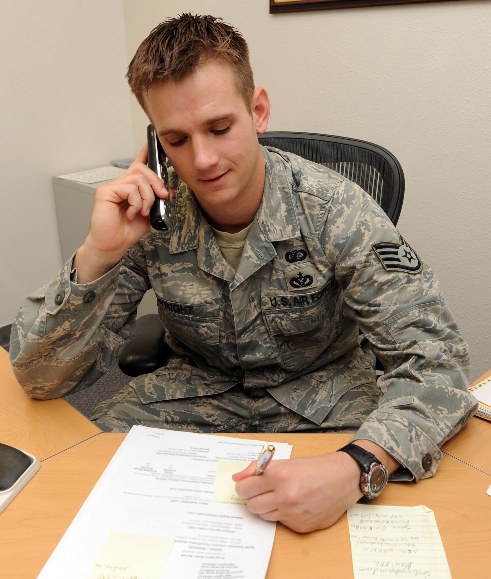 MOUNTAIN HOME AIR FORCE BASE, Idaho -- Staff Sgt David Wright, 366th Contracting Squadron service contract specialist, discusses information regarding a service contract for end of year Sept 10. The Contracting Squadron optimizes mission execution by ensuring high quality, timely support, and that they are consistent with federal acquisition regulations and public law. (U.S. Air Force photo by Senior Airman Debbie Lockhart)