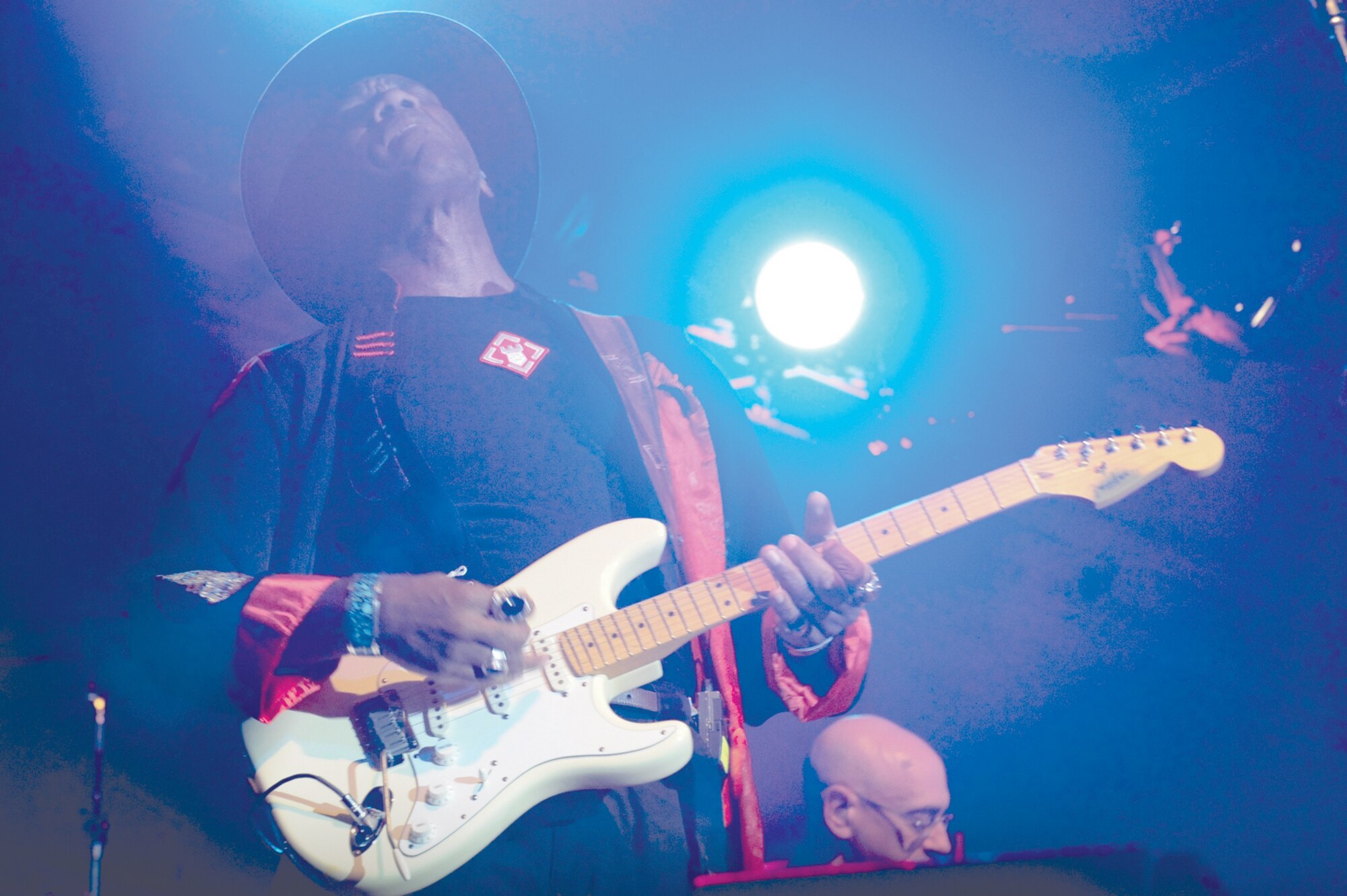 Lead guitarist for the Lieutenant Dan Band, Kimo Williams, plays a solo during the band’s performance for service members and their families, Sept. 16. The band played cover songs that spanned many musical genres. (Photo by Air Force Staff Sgt. Joshua Garcia/JBER PAO)