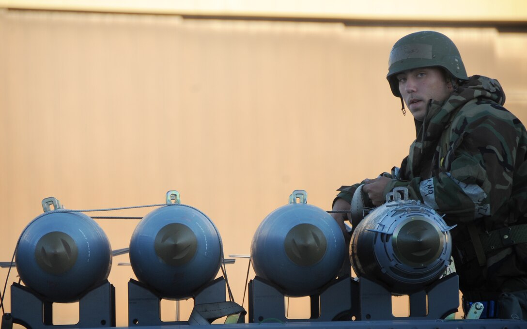 ELLSWORTH AIR FORCE BASE, S.D. -- Airman 1st Class James Jones, 28th Munitions Squadron weapons crew member, loads munitions for transport during a Phase II Operational Readiness Exercise, Sept. 16.  Airmen are tested on their skills in a simulated deployed environment during the exercise. (U.S. Air Force photo/Airman 1st Class Anthony Sanchelli)
