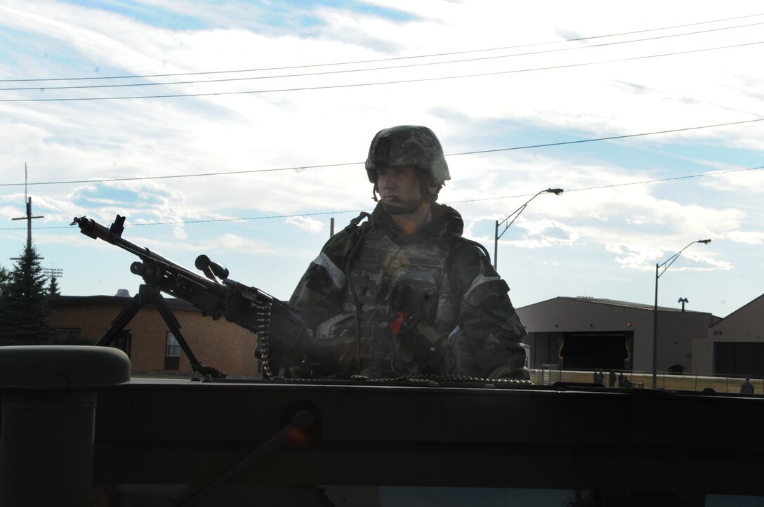 ELLSWORTH AIR FORCE BASE, S.D. -- Senior Airman Chadwick Richardson, 28th Security Forces Squadron response force leader, provides security during a Phase II Operational Readiness Exercise, Sept. 16.  The exercise tests Airmen on their skills in a simulated deployed environment. (U.S. Air Force photo/Airman 1st Class Anthony Sanchelli)
