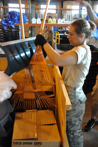 WRIGHT-PATTERSON AIR FORCE BASE, Ohio - Tech. Sgt. Natalie Storms, 87th Aerial Port Squadron, packs up equipment used for Sept. 18 Air Force Marathon. Most of the equipment will be stored until 2011. (U.S. Air Force photo/Staff Sgt. Robert Nelson)