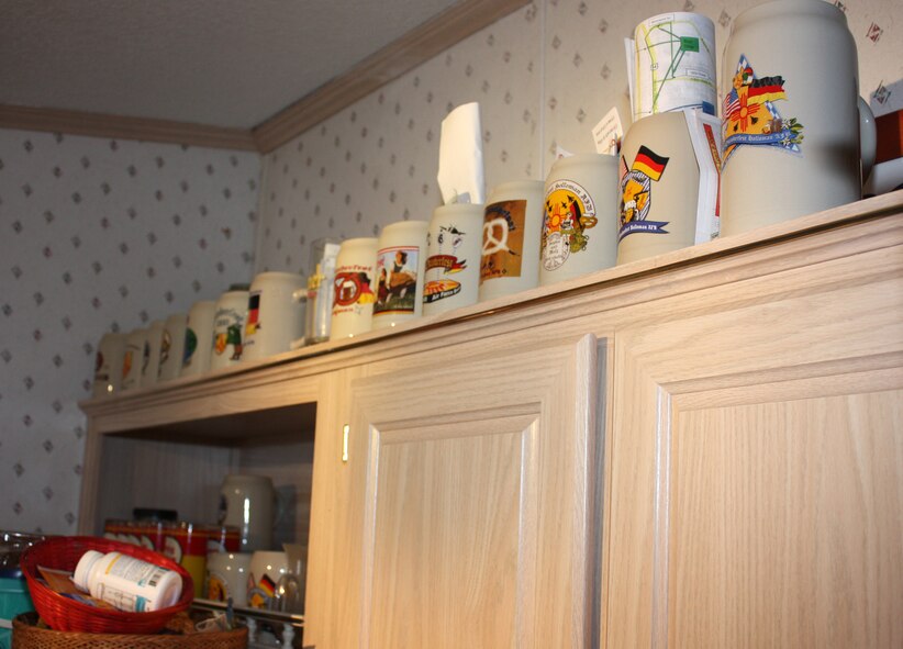 ALAMOGORDO, N.M. -- Fourteen mugs from Holloman Air Force Base's Oktoberfest sit lined up, Sept. 15, 2010, in the home of Pat Morgan -- one of Alamogordo's biggest Oktoberfest fans. Although he's attended the event 13 times, the 61-year old U.S. Air Force veteran and his wife said they can't wait for this year's celebration. (German Air Force photo by Chief Master Sgt. Robert Meints)