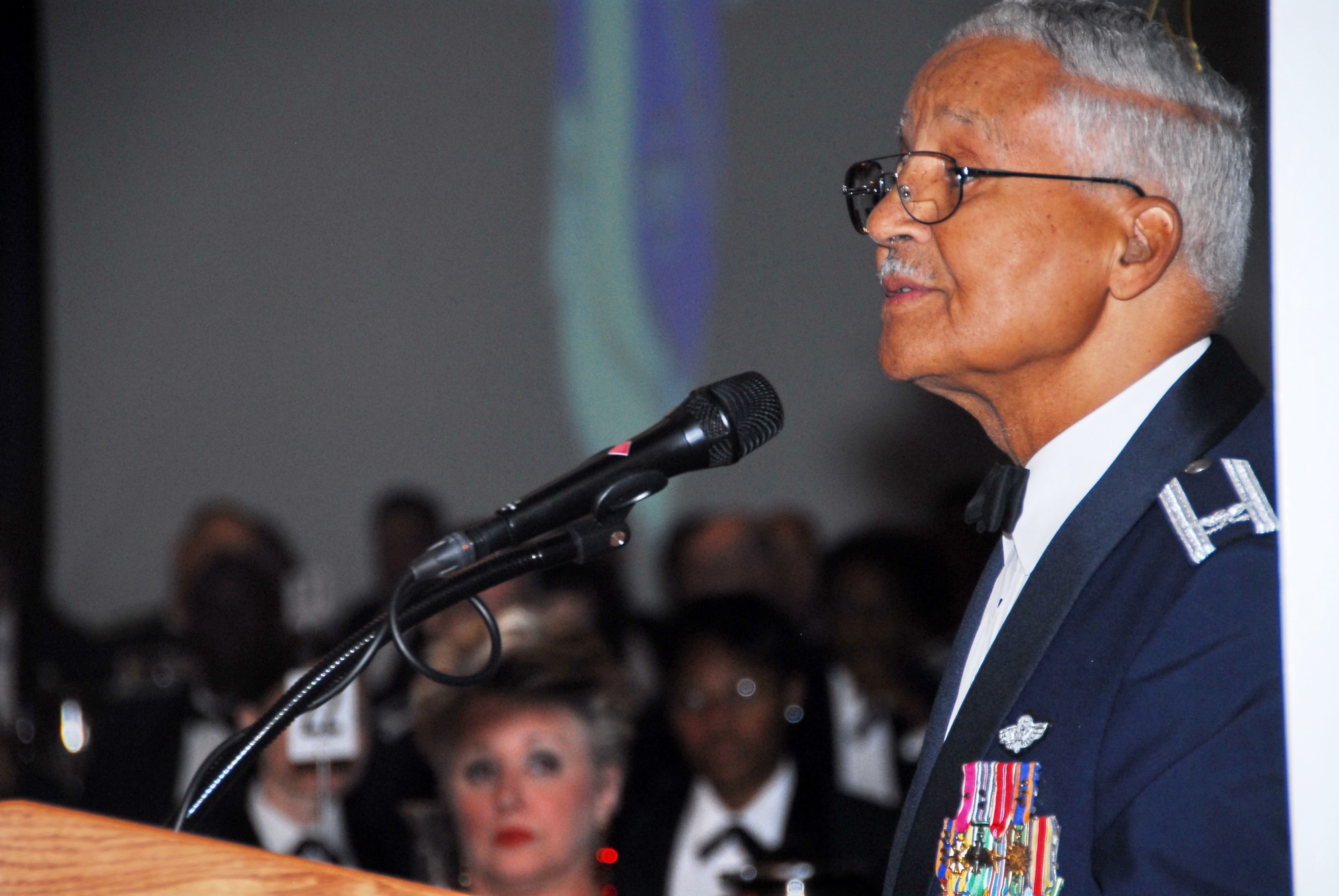 Retired Col. Edward C. McGee, a member of the Tuskegee Airmen, left, was the keynote speaker during AFDW’s 2010 Air Force Ball, held at Bolling Air Force Base. (U.S. Navy photo by Joseph P Cirone/Released)    