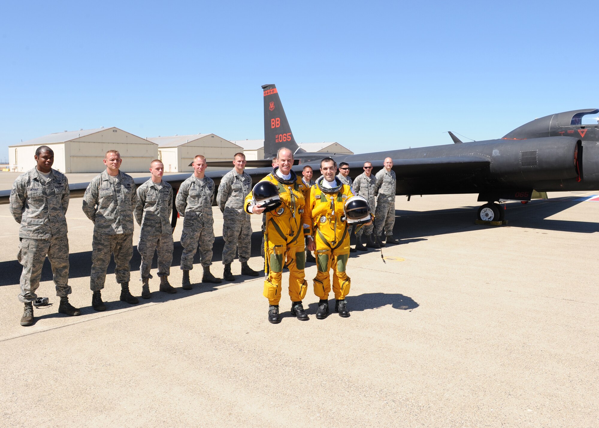 Gen. Kevin Chilton, commander, U.S. Strategic Command, poses for a photo with a U-2 instructor pilot and 9th Aircraft Maintenance Squadron Airmen after his high flight in the U-2 Dragon Lady. The U-2 is high altitude intelligence, surveillance and reconnaissance aircraft that can fly at 70,000 feet, and the pilots have to wear a special pressure suit to protect themselves from the extreme high altitudes. General Chilton visited Beale Air Force Base, Sept. 9-11. During his visit, the general was a guest speaker for a reunion of current and a former U-2 pilots, maintainers and support staff associated with the U-2 program. In addition to being a guest speaker at the reunion, He he saw firsthand how the remotely piloted aircraft RQ-4 Global Hawk provides high altitude intelligence surveillance and reconnaissance to forward deployed warfighters. 

“The U-2 and Global Hawk continue to make significant contributions today in forward operating areas, such as U.S. Central Command and provide surge capability to support combatant commanders around the world,” said General Chilton. 
