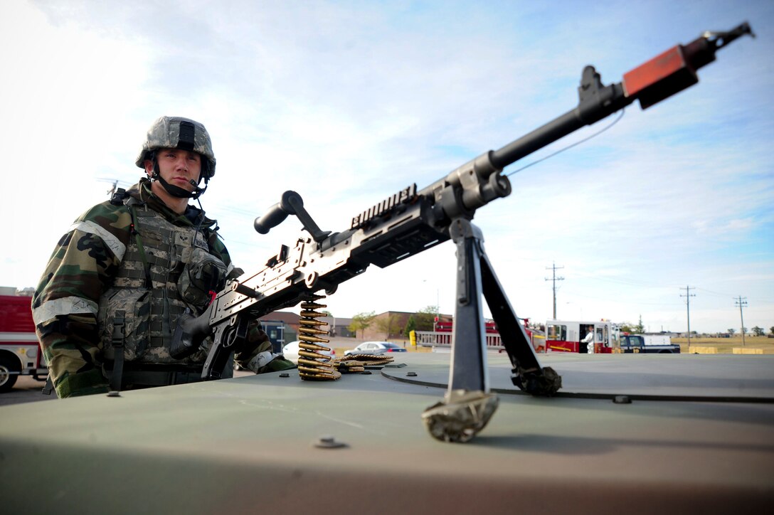 ELLSWORTH AIR FORCE BASE, S.D. – Senior Airman Chadwick Richardson, 28th Security Forces Squadron response force leader, provides security during a Phase II Operational Readiness Exercise, Sept. 16. The Phase II ORE is designed to mimic a deployed environment and test the combat abilities of Ellsworth Airmen. (U.S. Air Force photo/Senior Airman Corey Hook)