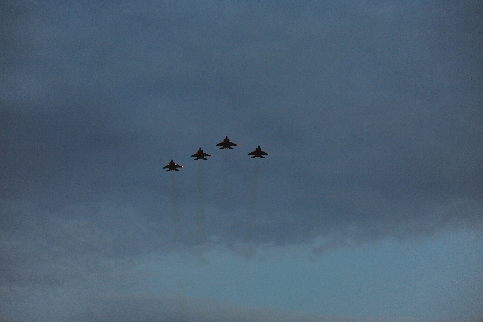 RALEIGH, N.C. – A four-ship formation of F-15E Strike Eagles from the 333rd Fighter Squadron at Seymour Johnson Air Force Base perform a flyover at the Carter-Finley Stadium in Raleigh during a game’s opening ceremony Sept. 16, 2010. The N.C. State Wolfpack’s invited military members from across the state to attend the game to show appreciation for their service.  (U.S. Air Force photo/Master Sgt. Brandt Smith)