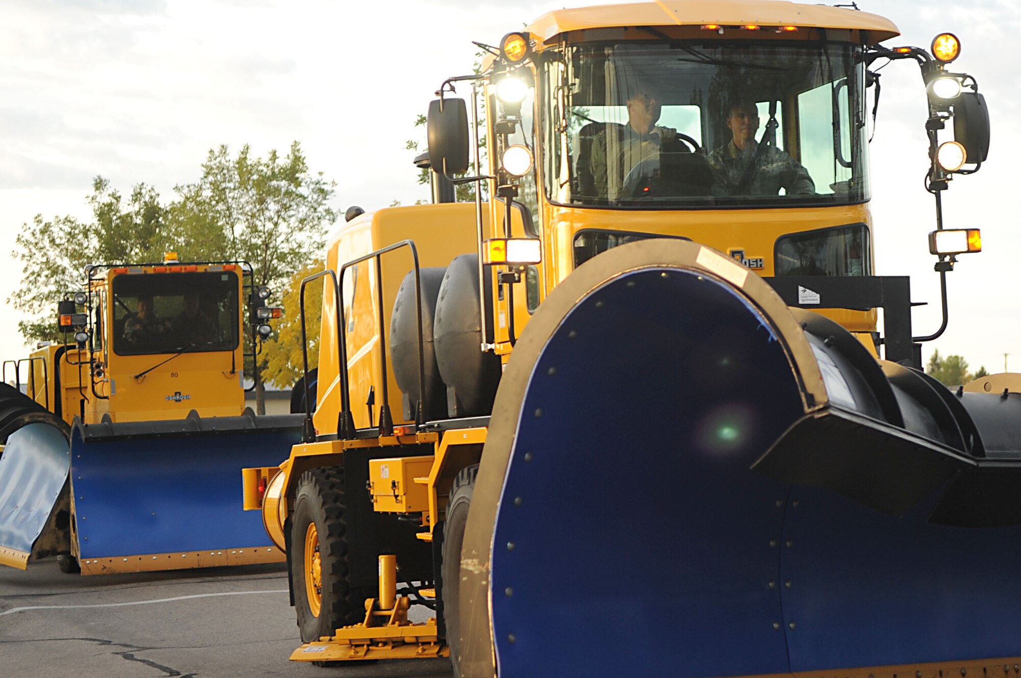 Col. Don Shaffer, 319th Air Refueling Wing commander, lead the 319th ARW Snow Parade Sept. 22 through Grand Forks Air Force Base. The parade allows base personnel to see the snow removal equipment before the first snow fall.  (U.S. Air Force photo by Senior Airman Amanda N. Stencil)